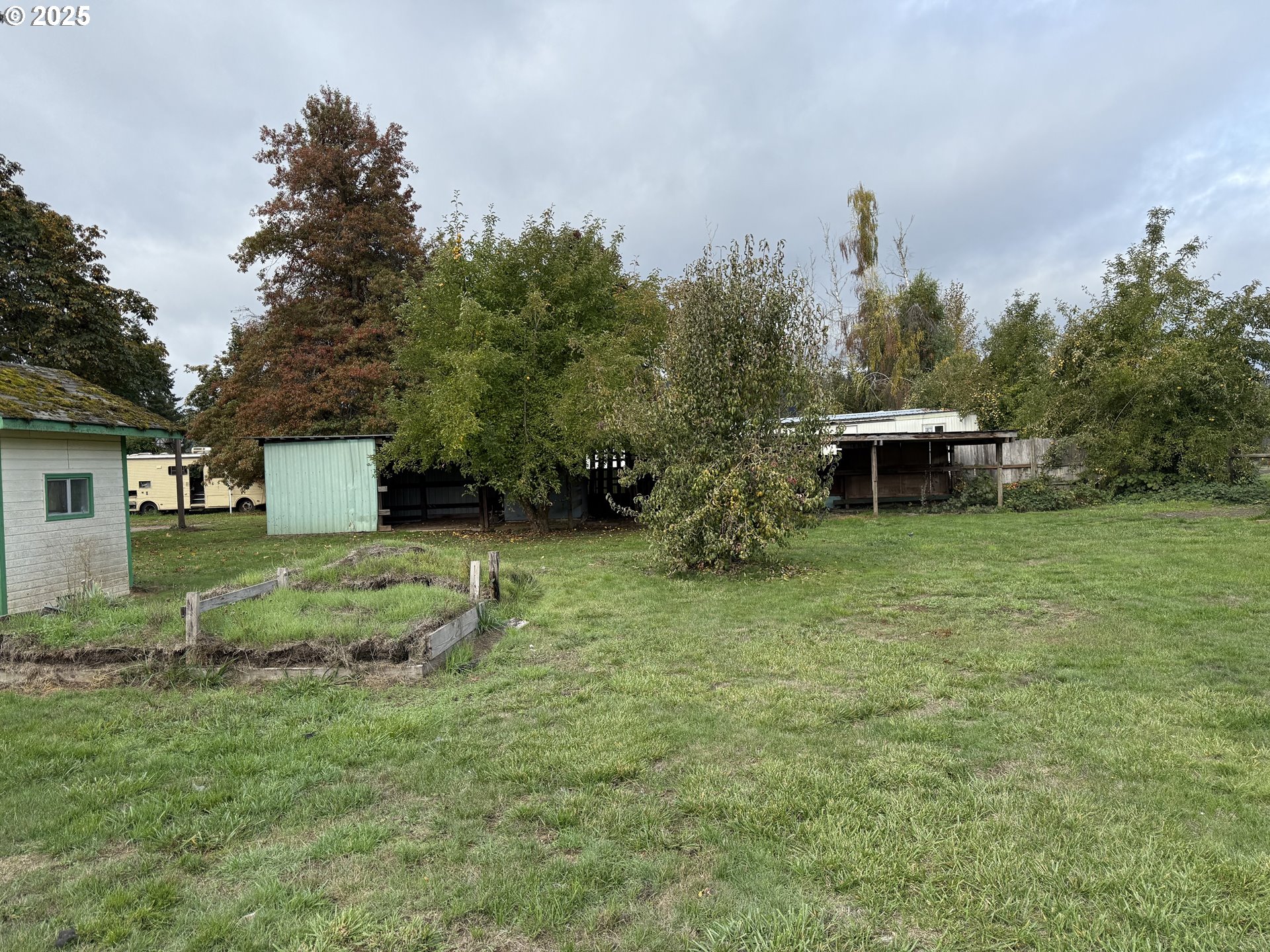 33425 Tate Road Creswell, OR 97426 - Photo 13 of 15 a view of a house with a yard