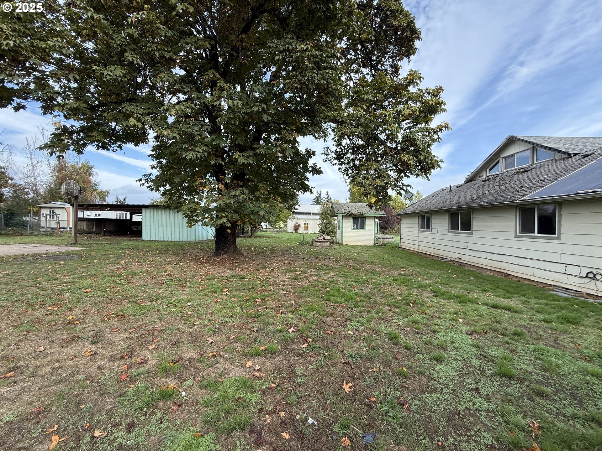 33425 Tate Road Creswell, OR 97426 - Photo 4 of 15 a view of a house with a yard