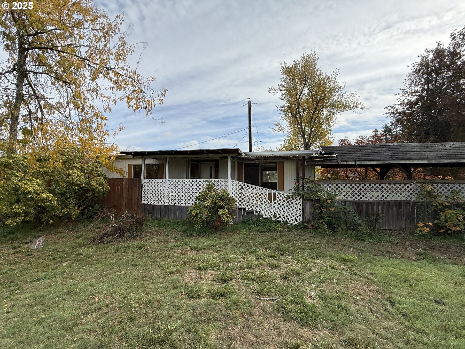 33425 Tate Road Creswell, OR 97426 - Photo 10 of 15 a front view of a house with garden
