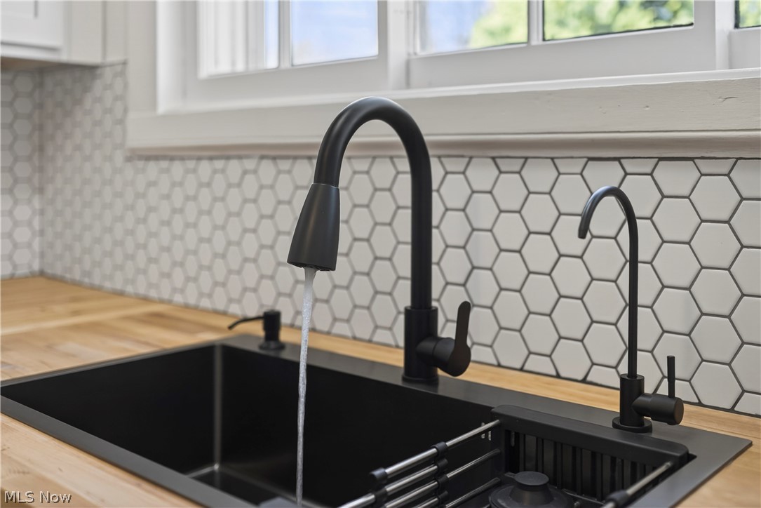 14939 Caves Road Novelty, OH 44072 - Photo 13 of 42 Kitchen view of a sink and wooden counters