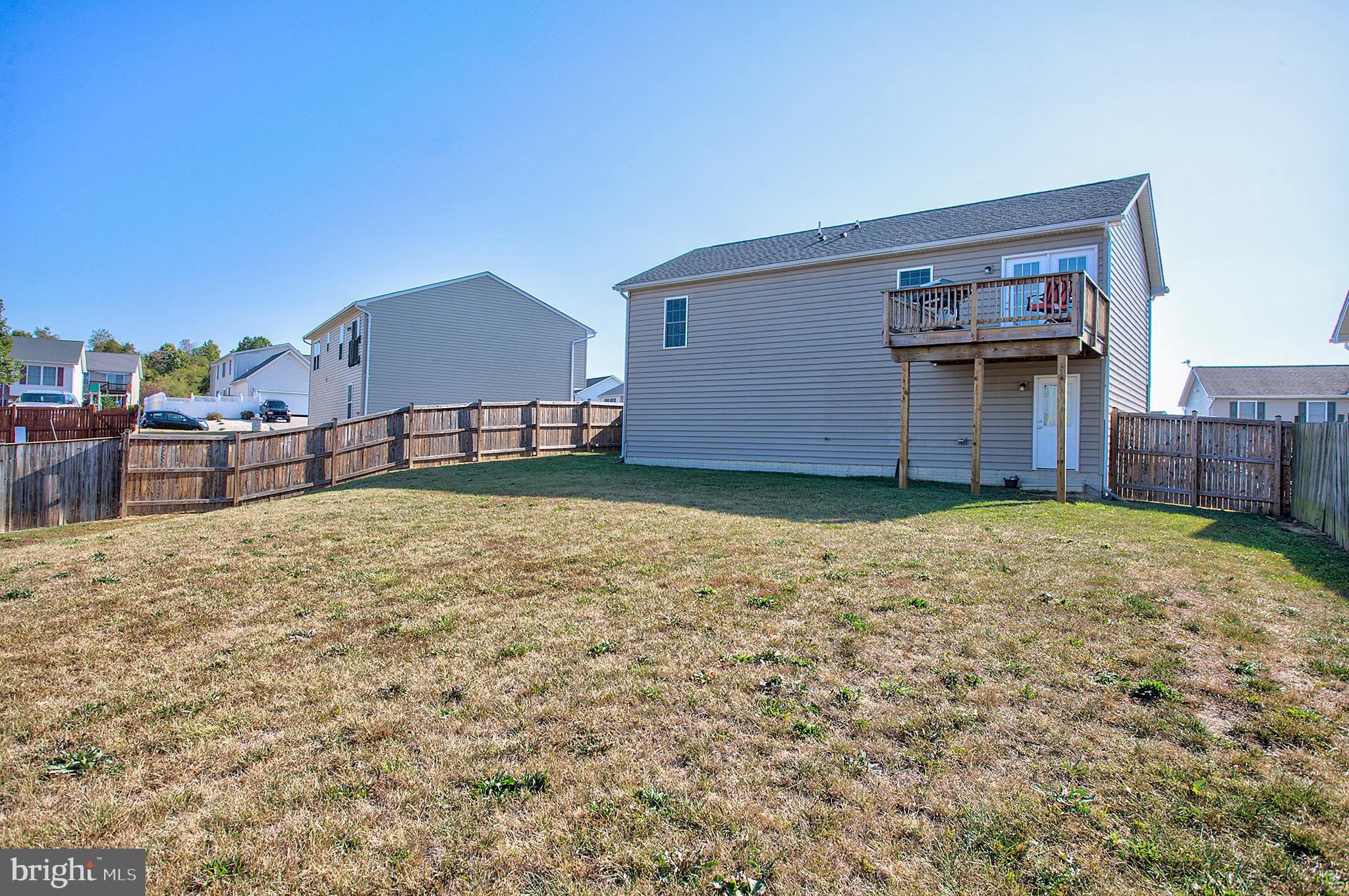 141 Buchanan Lane Inwood, WV 25428 - Photo 28 of 32 Fully fenced big yard for garden or pets.