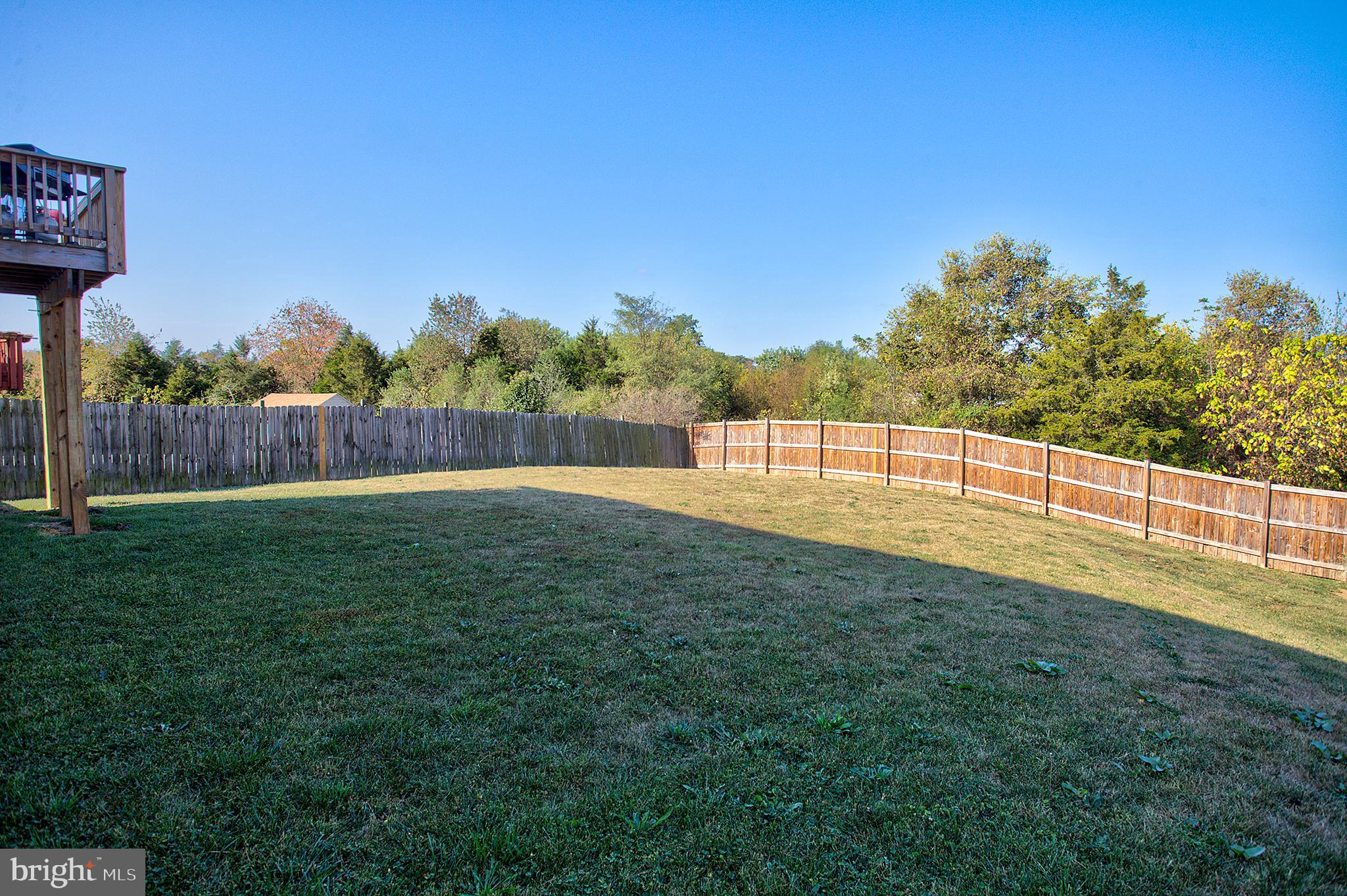 141 Buchanan Lane Inwood, WV 25428 - Photo 6 of 32 Privacy fencing by Long Fence