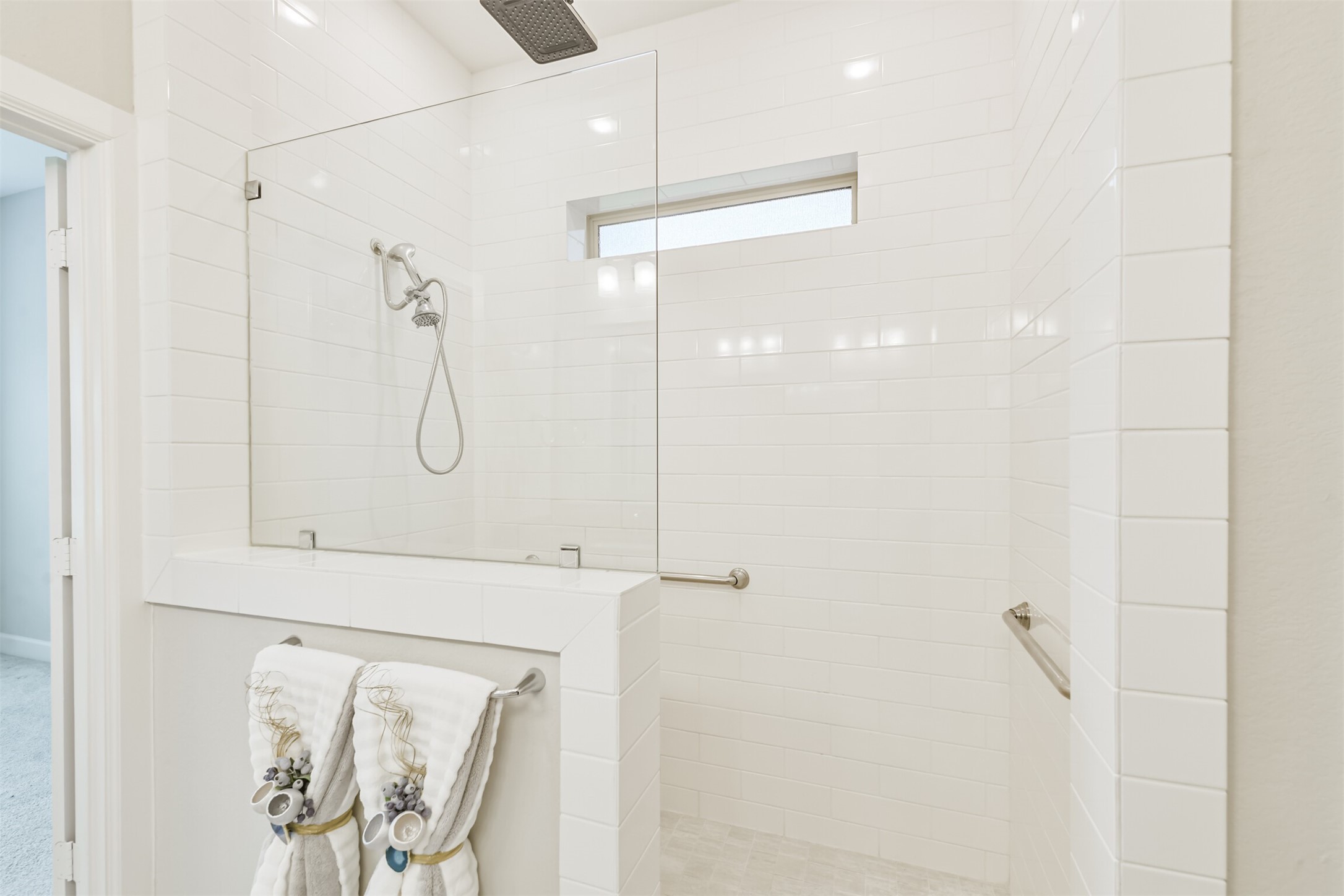 15611 Rising Wren Court Conroe, TX 77302 - Photo 30 of 38 a bathroom with a shower and a mirror