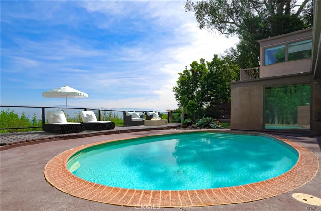 13425 Java Drive Beverly Hills, CA 90210 - Photo 14 of 28 a view of a swimming pool with a yard