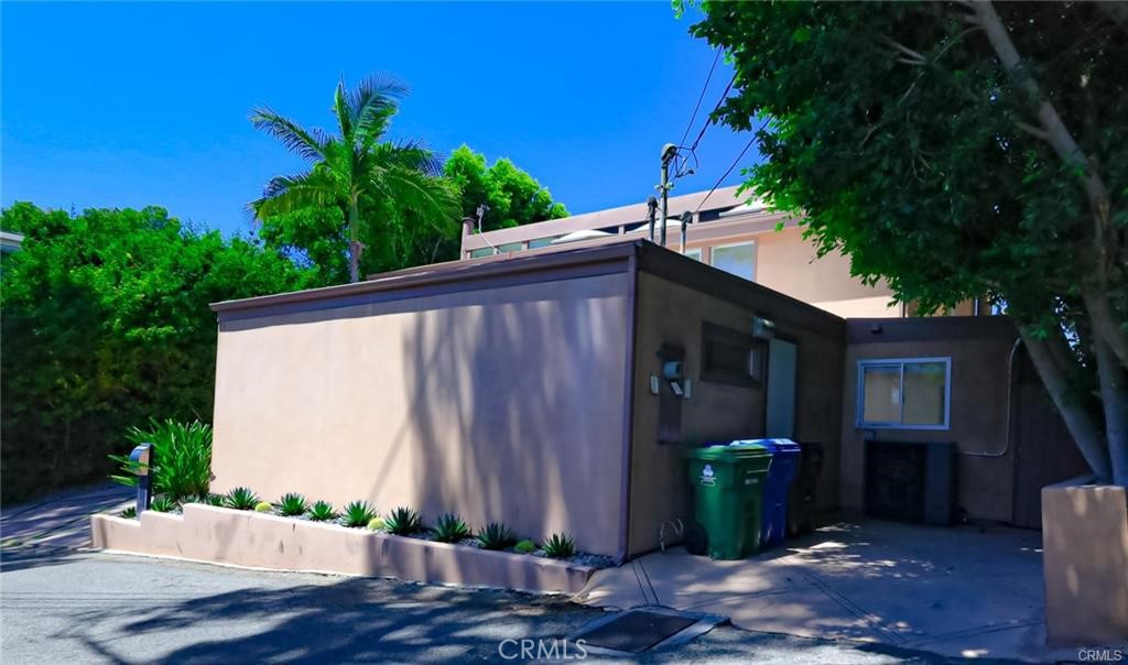 13425 Java Drive Beverly Hills, CA 90210 - Photo 16 of 28 a couple of potted plants in front of door