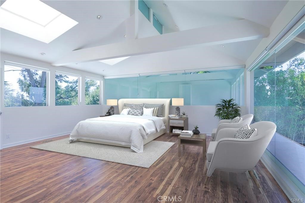 13425 Java Drive Beverly Hills, CA 90210 - Photo 21 of 28 a spacious bedroom with a bed and a large window