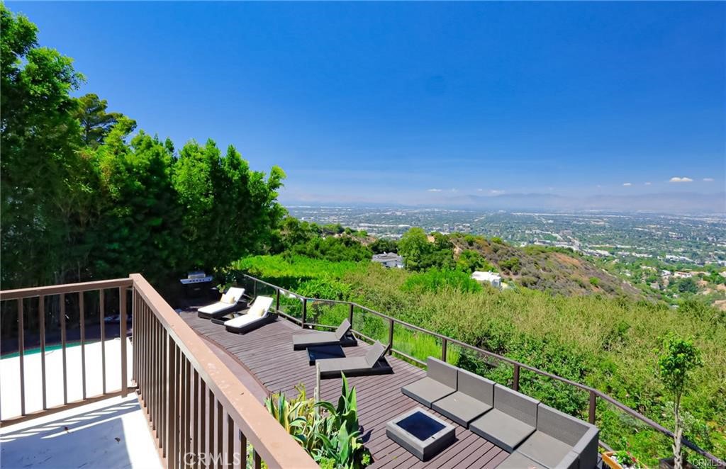 13425 Java Drive Beverly Hills, CA 90210 - Photo 8 of 28 a view of a balcony with wooden floor and outdoor space