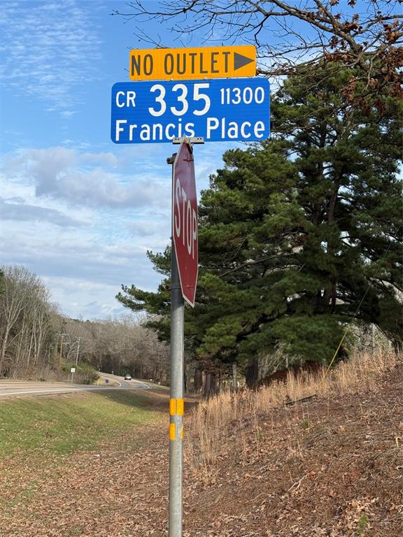 335 Tyler Tx 75708 Tyler, TX 75708 - Photo 1 of 10 a sign that is on the side of a road