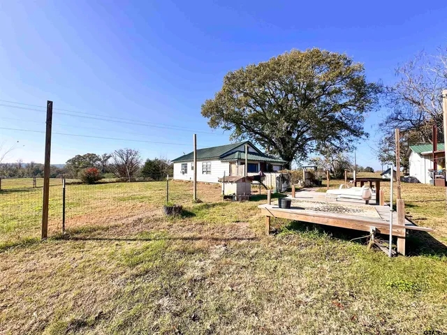a view of ocean with a yard