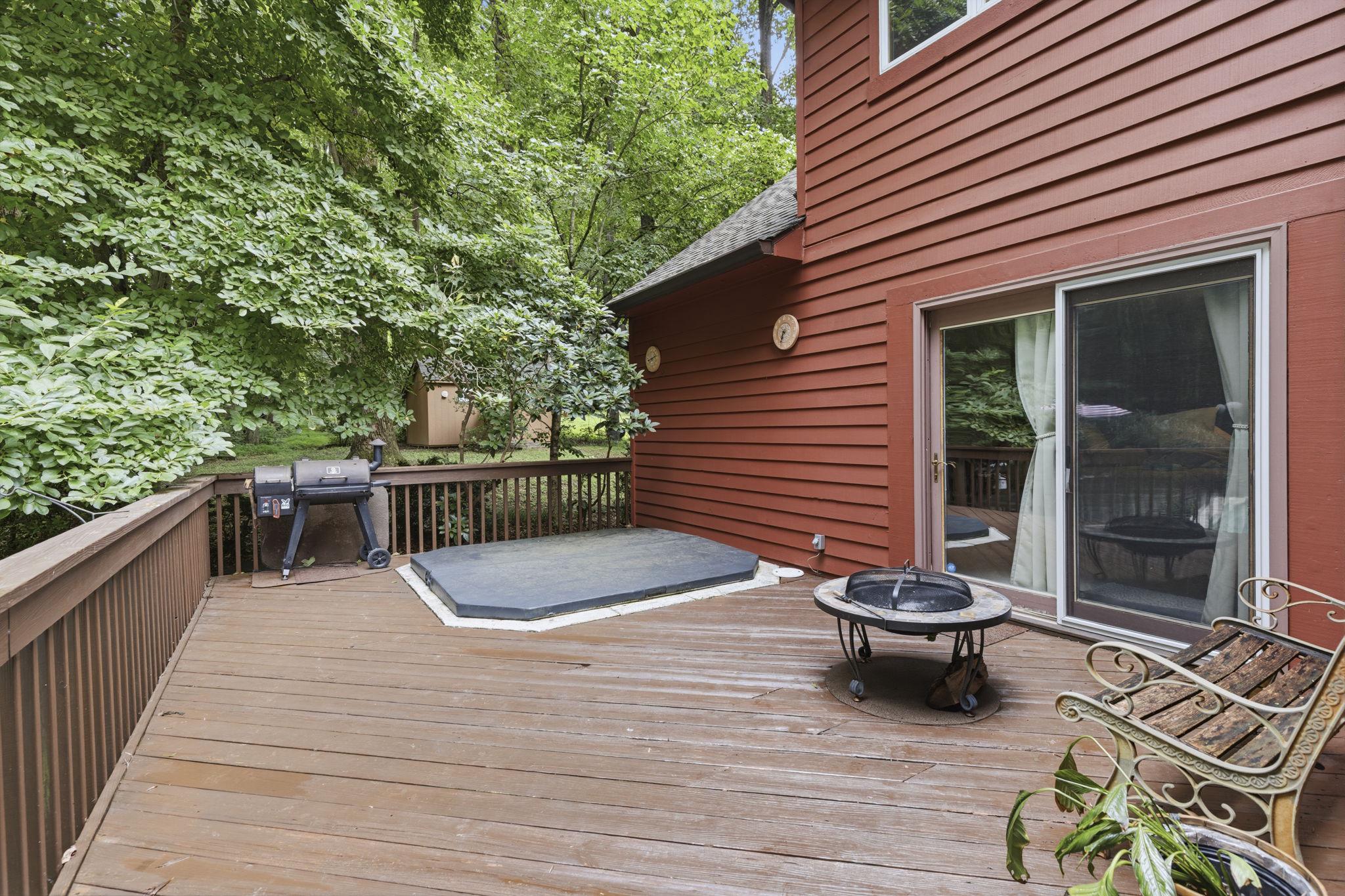 1109 Timber Trail Road Towson, MD 21286 - Photo 45 of 47 Spacious deck nestled in lush greenery.