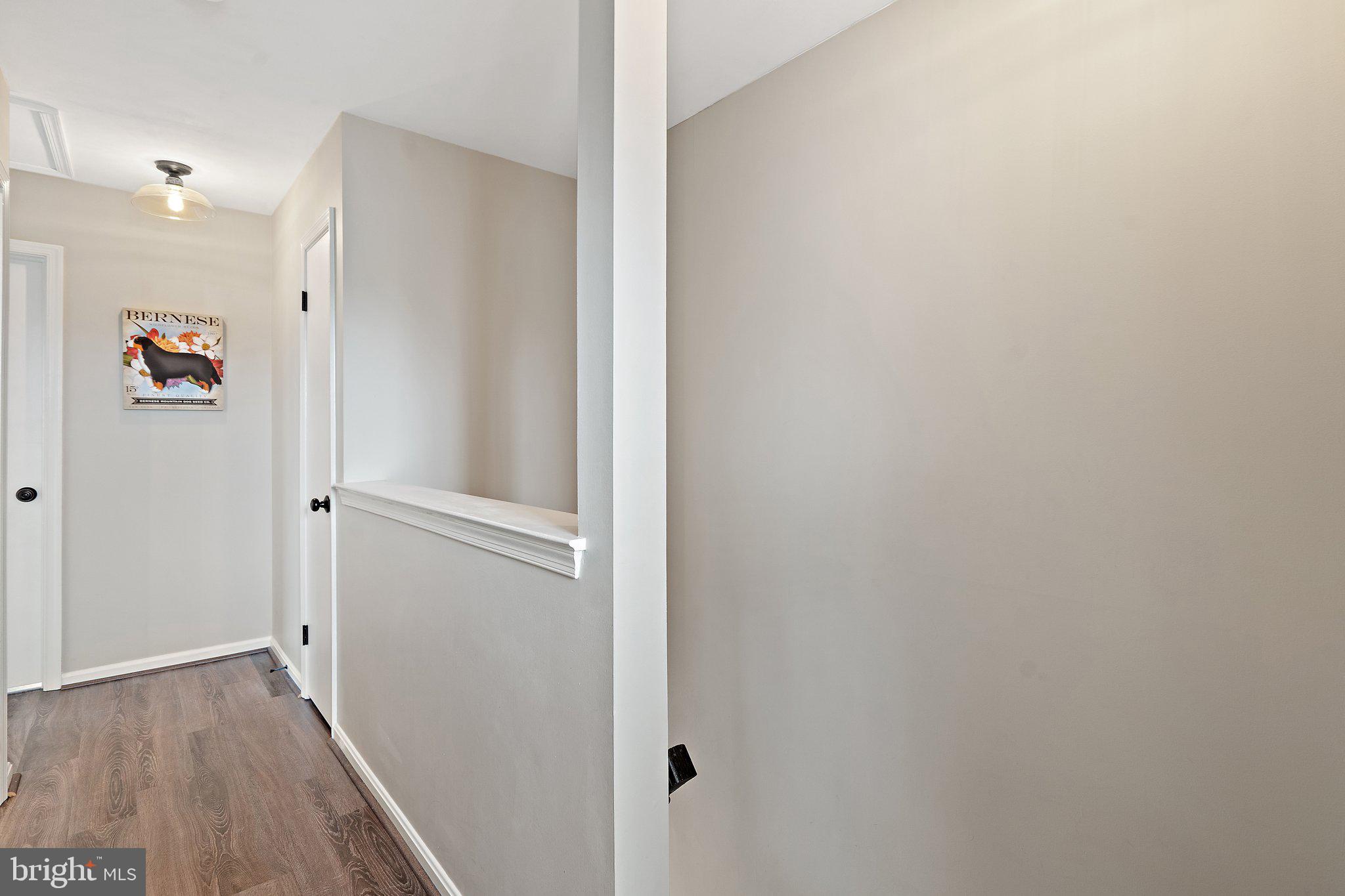 14801 Rising Sun Lane Haymarket, VA 20169 - Photo 22 of 39 Upper level with new laminate plank flooring