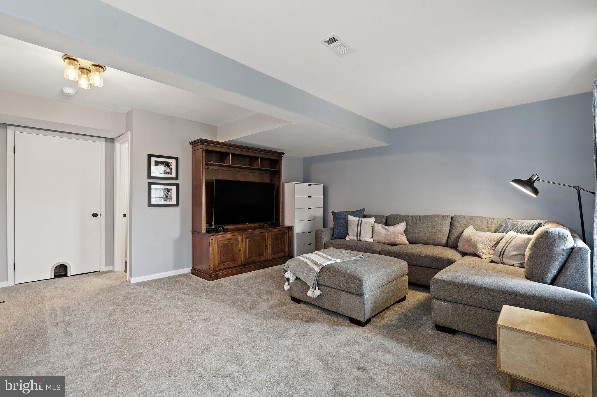 14801 Rising Sun Lane Haymarket, VA 20169 - Photo 26 of 39 Large recreation room in basement - new carpet