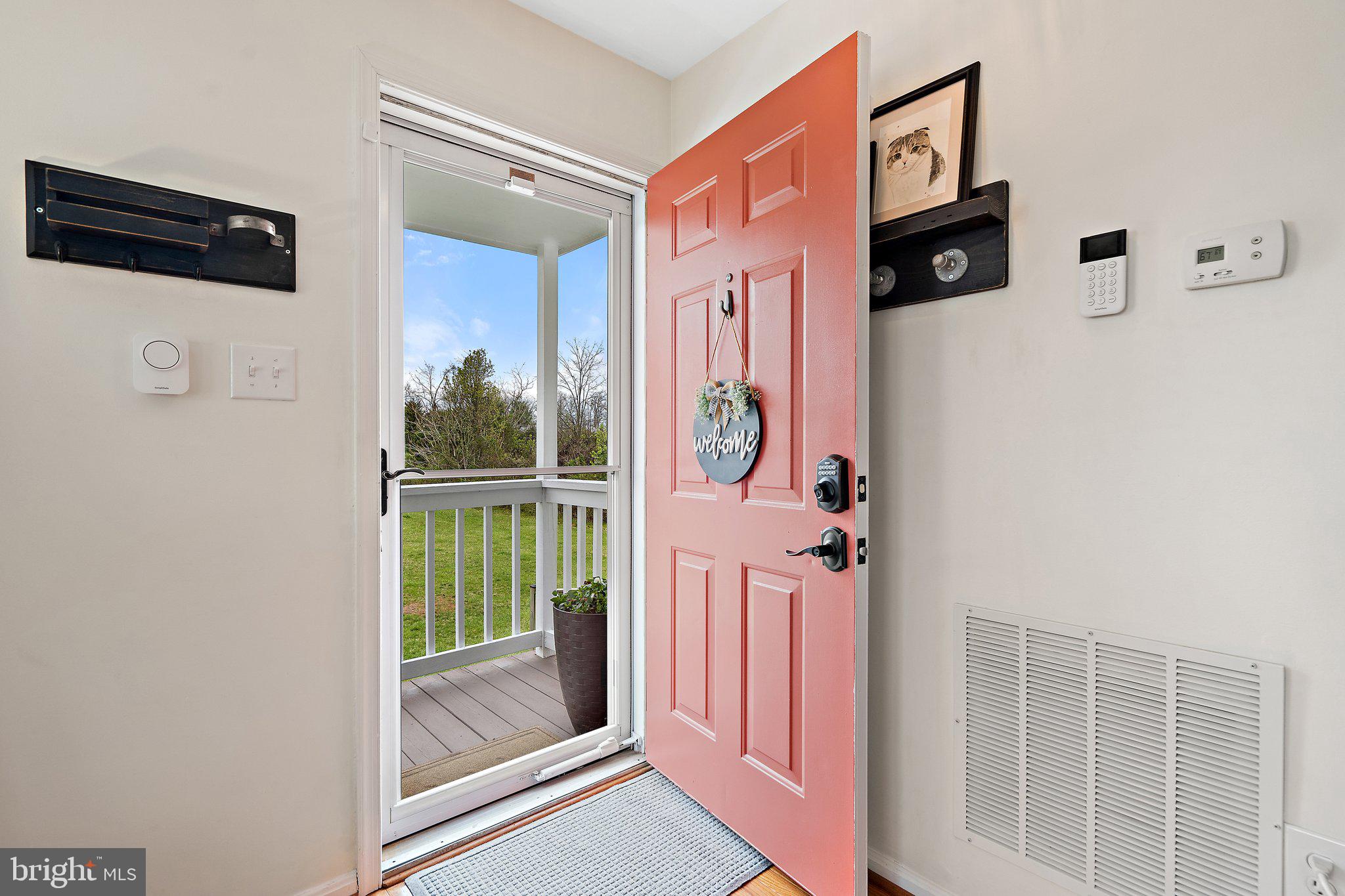 14801 Rising Sun Lane Haymarket, VA 20169 - Photo 7 of 39 Storm door to enjoy the view and let light in
