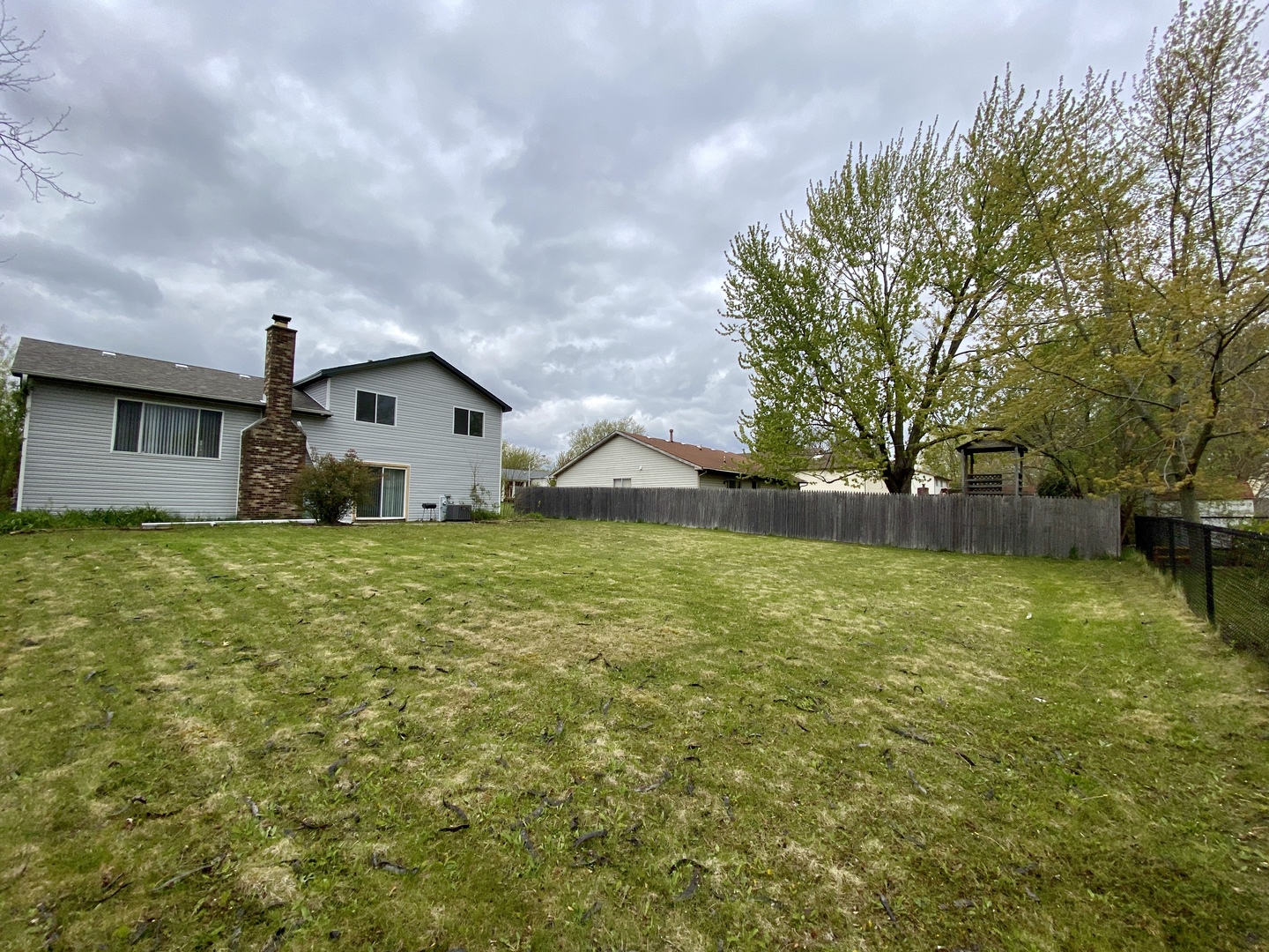 231 Oakhurst Road Matteson, IL 60443 - Photo 8 of 8 a house view with swimming pool in front of it