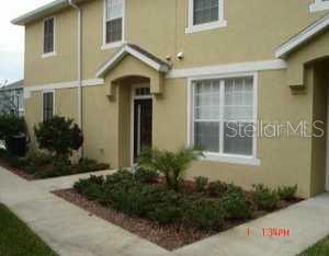 27707 Pleasure Ride Loop Wesley Chapel, FL 33544 - Photo 1 of 1 a front view of a house with a yard