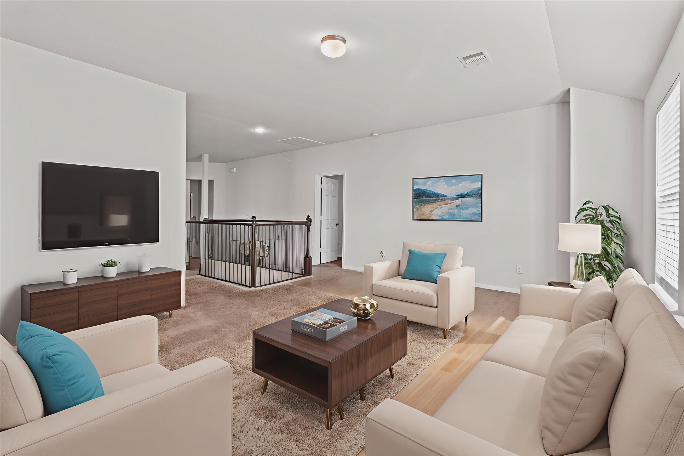 14610 Ruddy Duck Lane Houston, TX 77049 - Photo 20 of 24 a living room with furniture and a flat screen tv
