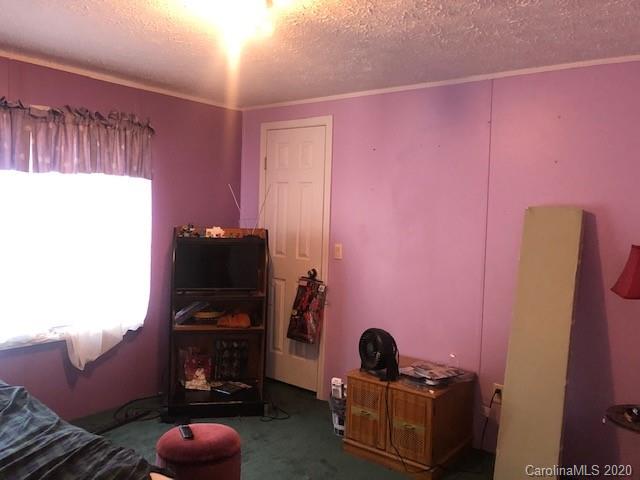 1431 Minter Road Chester, SC 29706 - Photo 5 of 11 a room with furniture and a potted plant