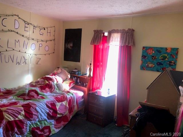 1431 Minter Road Chester, SC 29706 - Photo 6 of 11 a bedroom with a bed and a window