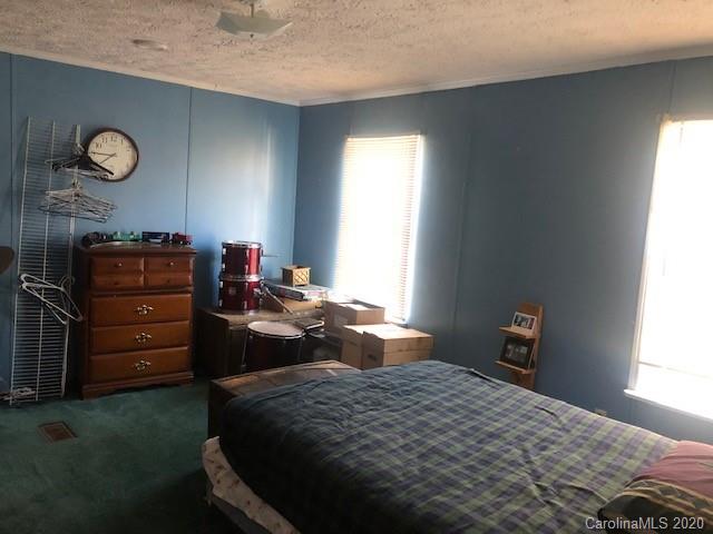 1431 Minter Road Chester, SC 29706 - Photo 9 of 11 a bedroom with a bed and a closet