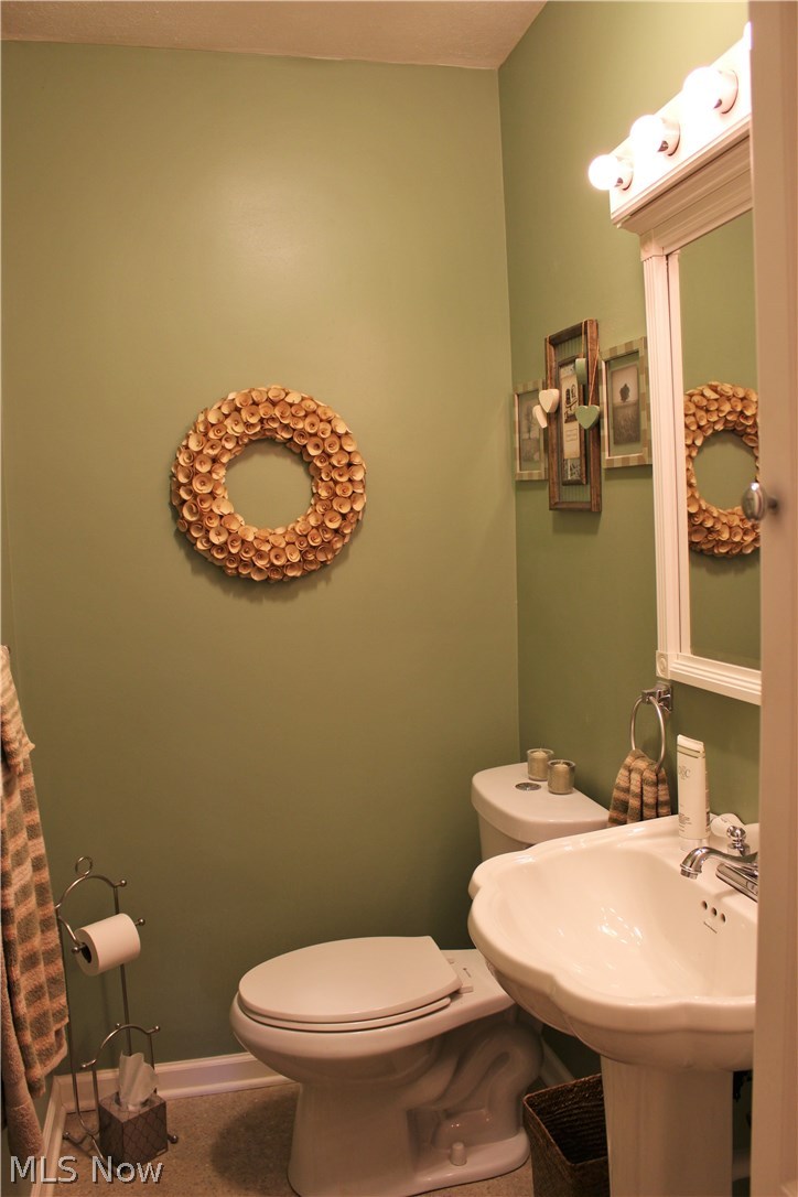 10471 Prouty Road Painesville, OH 44077 - Photo 21 of 33 Updated half bath with pedestal sink.