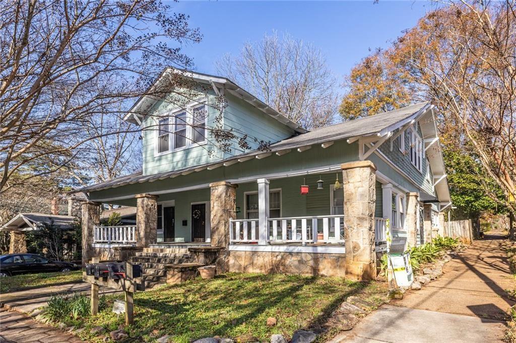 976 Delaware Avenue Southeast, Unit 2 Atlanta, GA 30316 - Photo 1 of 1 a front view of a house with garden