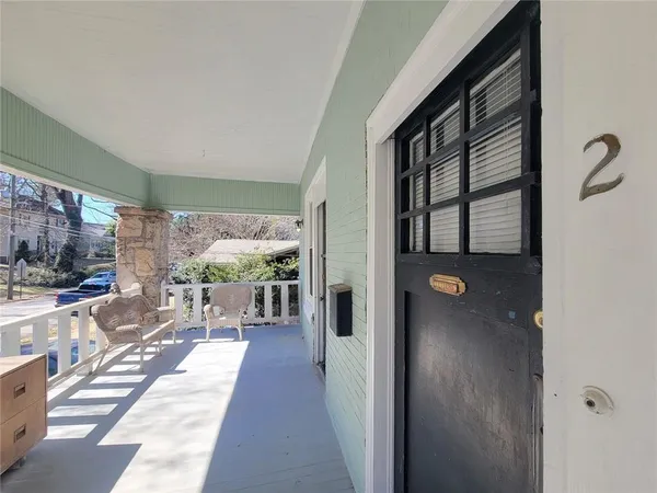 a view of a living room and a porch