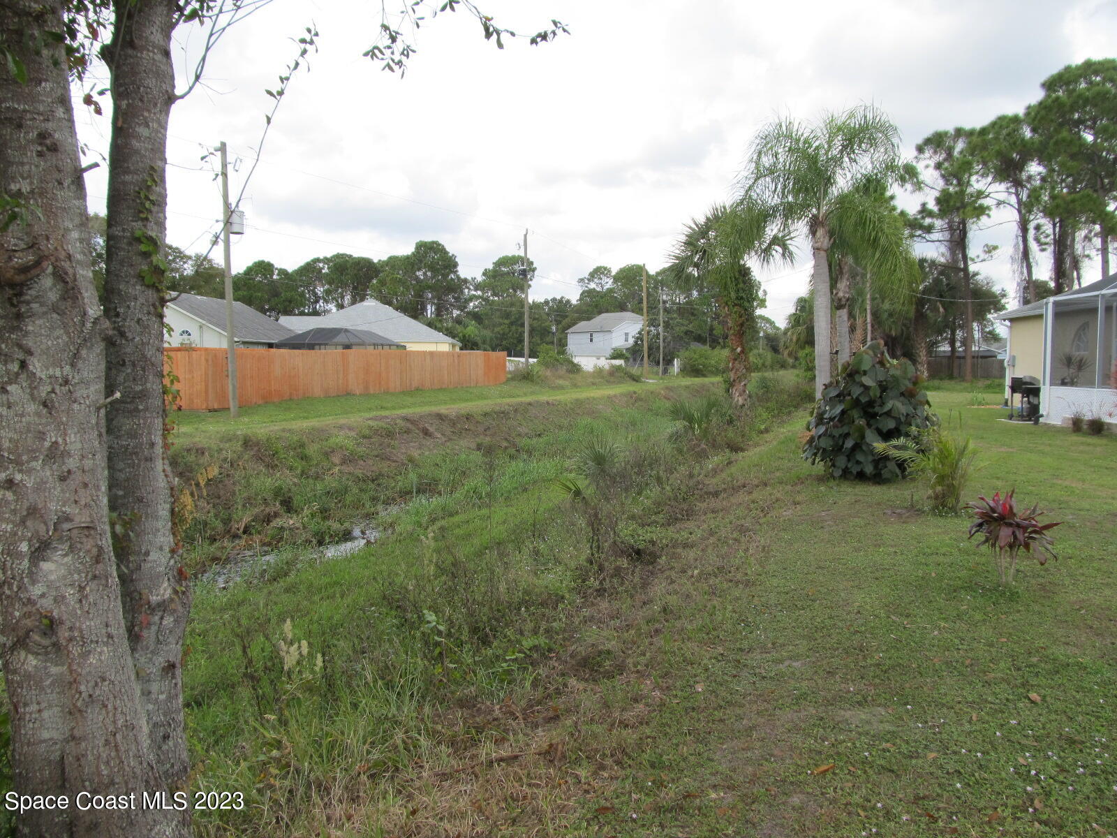 600 Roth Court Southeast Palm Bay, FL 32909 - Photo 46 of 53 Drainage Canal for Privacy on West Side