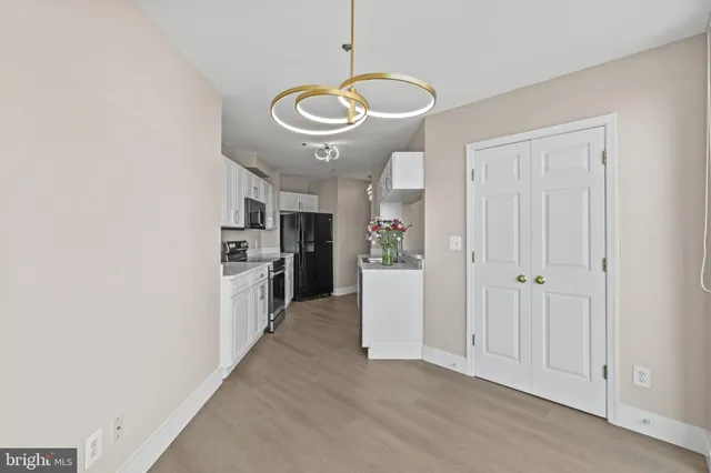 an aerial view of a city with ocean view