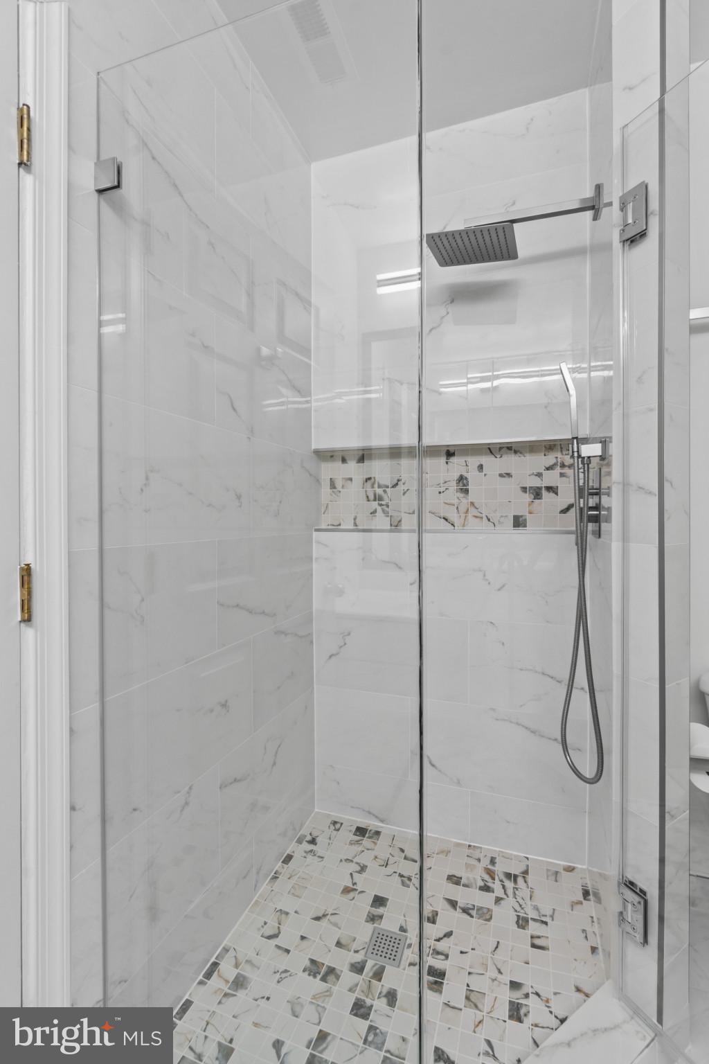 100 Harborview Drive, Unit 1312 Baltimore, MD 21230 - Photo 27 of 37 a bathroom with a shower