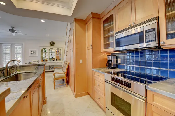 a kitchen with a stove and a sink