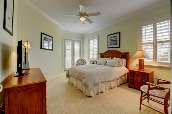a bedroom with bed and window