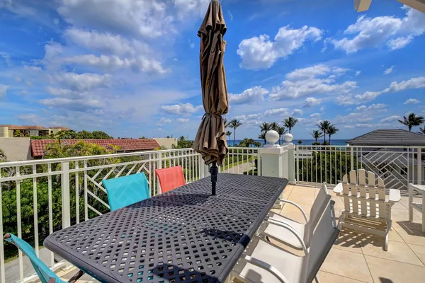 a balcony with view of city