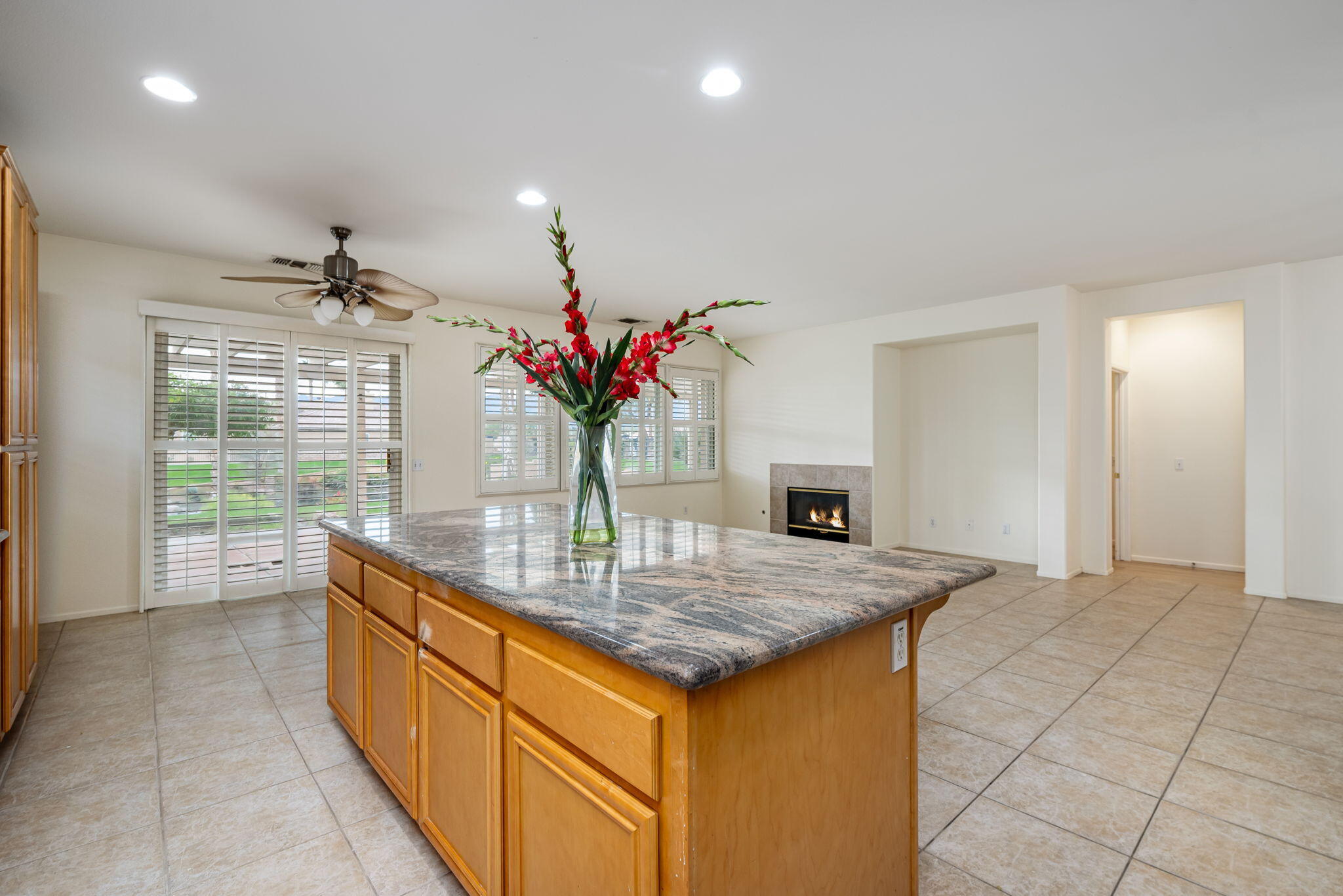 82631 Redford Way Indio, CA 92201 - Photo 23 of 43 a dining hall with granite countertop kitchen island stainless steel appliances a sink and cabinets