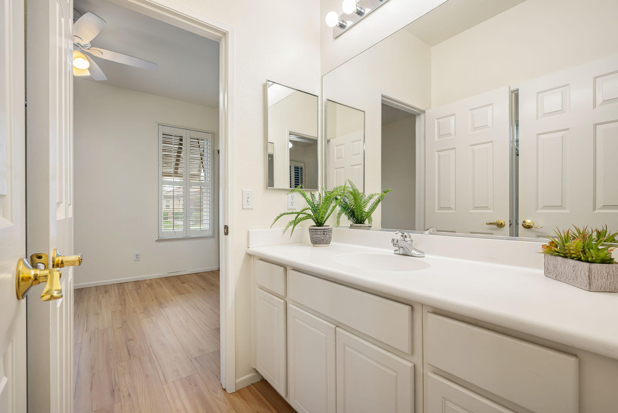 82631 Redford Way Indio, CA 92201 - Photo 35 of 43 a bathroom with a sink and a mirror