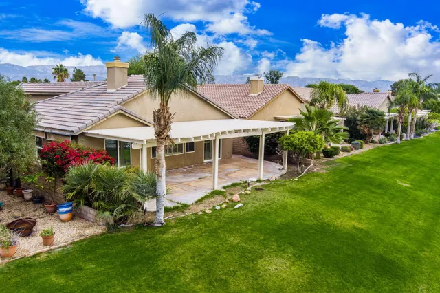 a garden view with a seating space