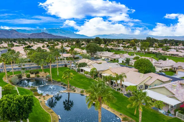 a view of a lake with a houses