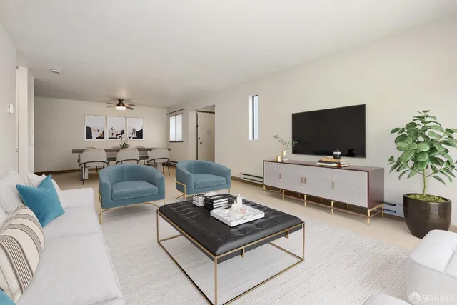 a living room with furniture and a flat screen tv