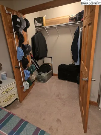 a bedroom with a bed and a cabinets