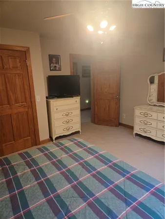 a bathroom with a sink toilet and a mirror