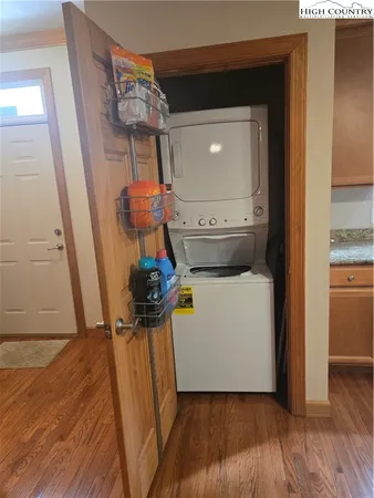 a view of living room with furniture and wooden floor