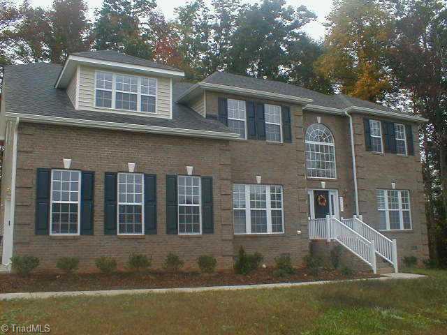 8410 Chartwell Drive Oak Ridge, NC 27310 - Photo 1 of 7 Exterior Front.