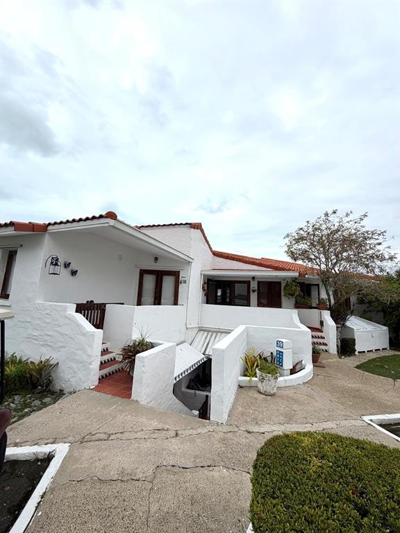 Rio Mar Rio Mar Rio Mar Rio Grande, PR 00745 - Photo 1 of 1 a view of a patio with couches and potted plants