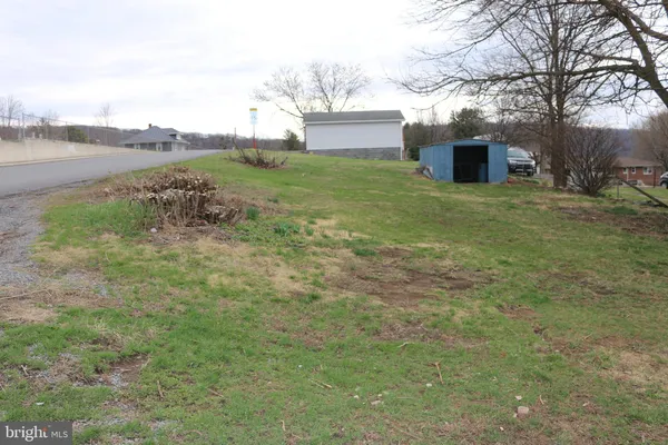 a view of a yard with an outdoor space