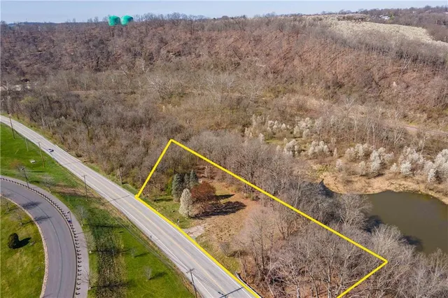 a view of swimming pool with a yard