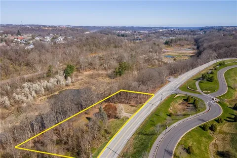a view of a balcony with furniture
