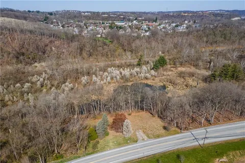 a view of a lake from a balcony