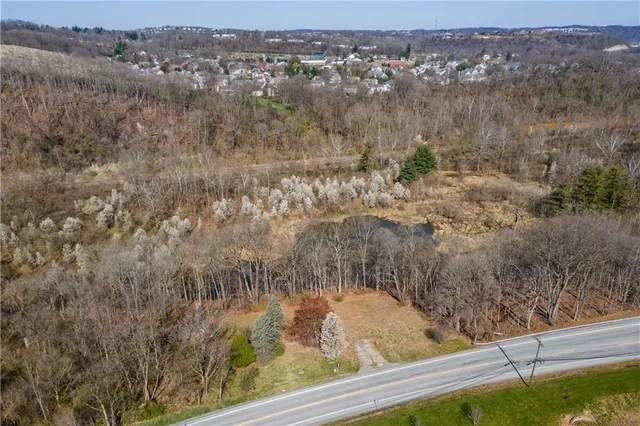 a view of a lake from a balcony