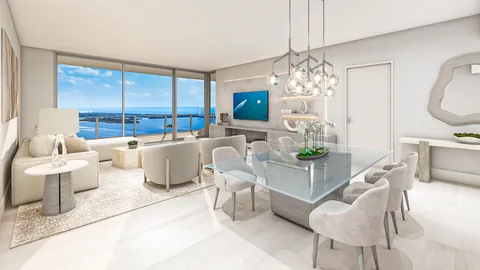 a living room with furniture a chandelier and a chandelier