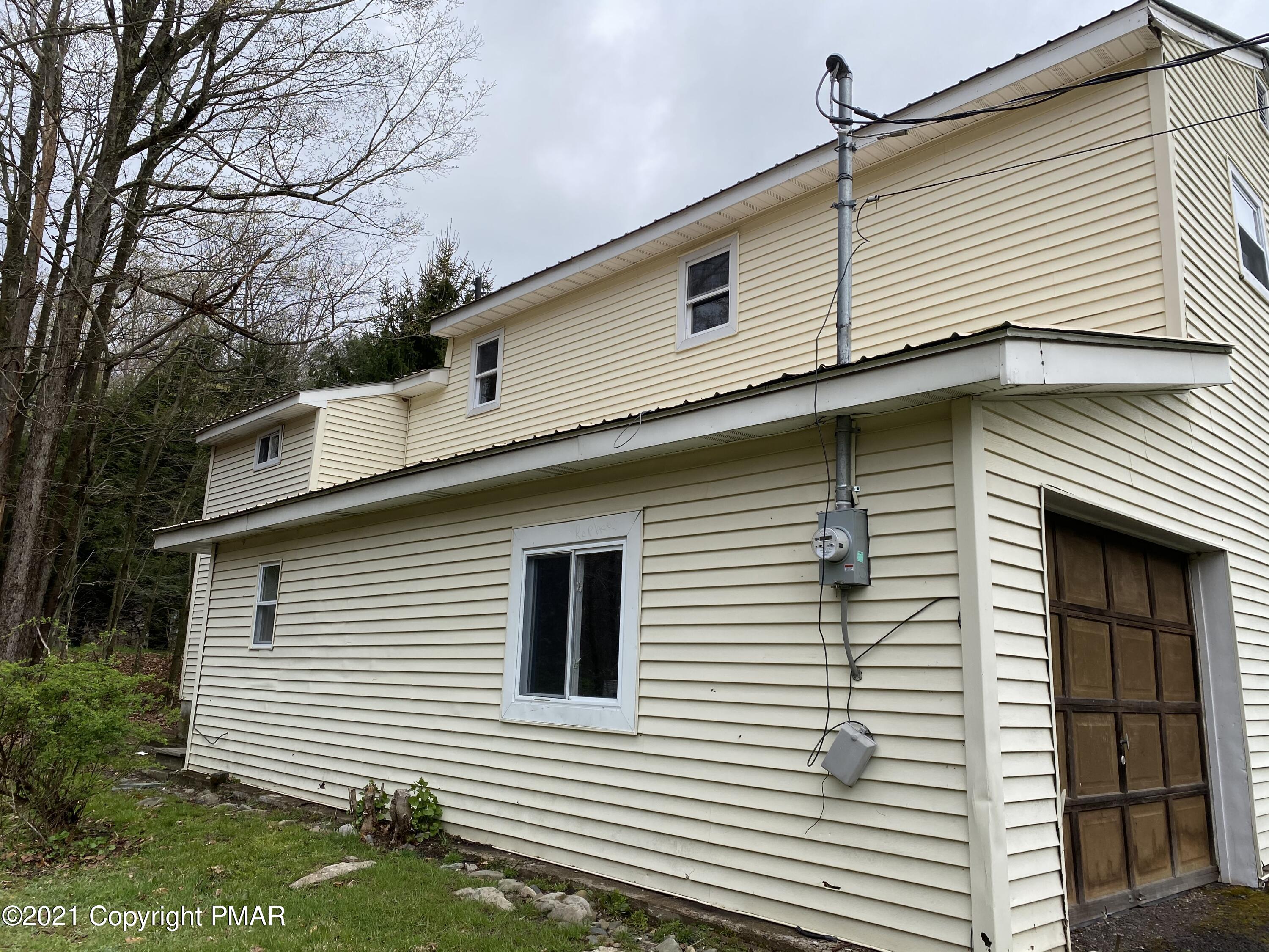 3181 Chip Path Gouldsboro, PA 18424 - Photo 13 of 13 a view of a house with a yard