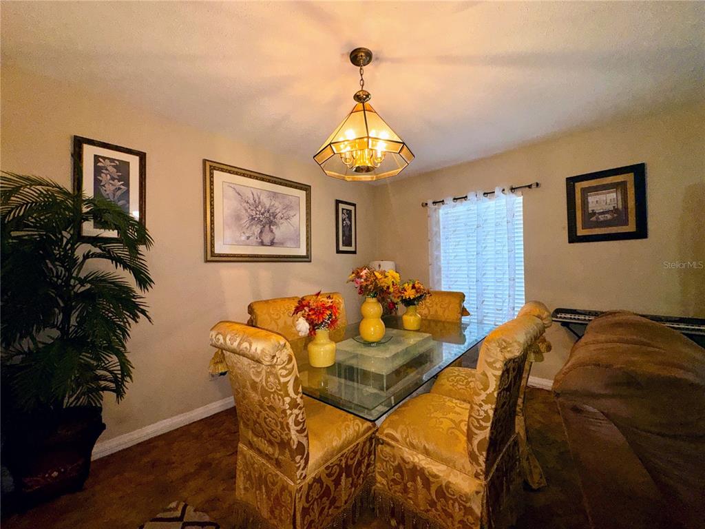 2908 Forest Circle Seffner, FL 33584 - Photo 12 of 46 a bed sitting in a bedroom next to a window